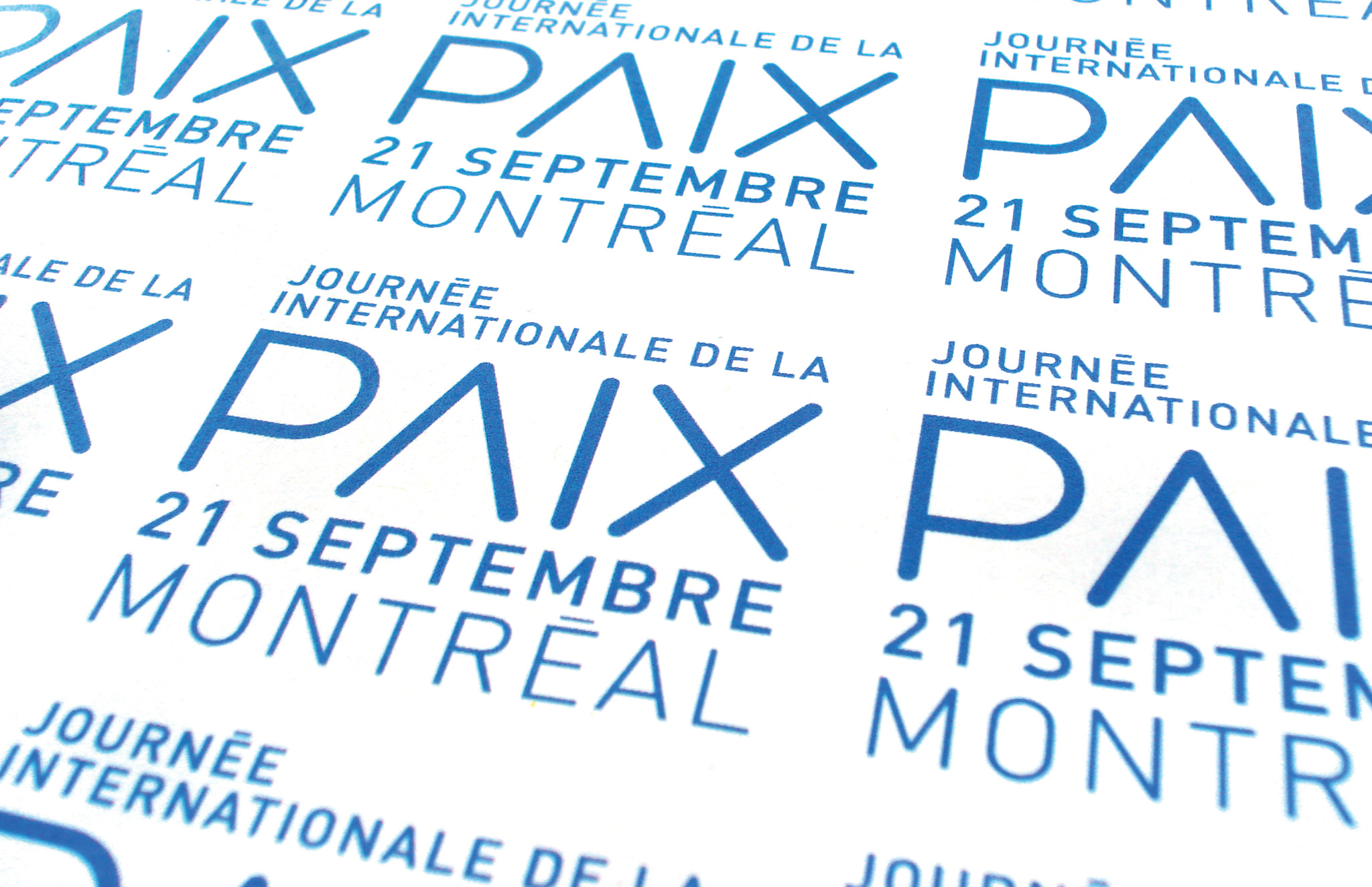 Logo pour la Journée Internationale de la Paix de Montréal.